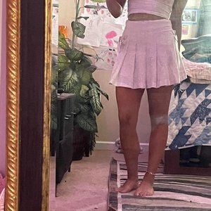 pink sparkly mini skirt with buckles